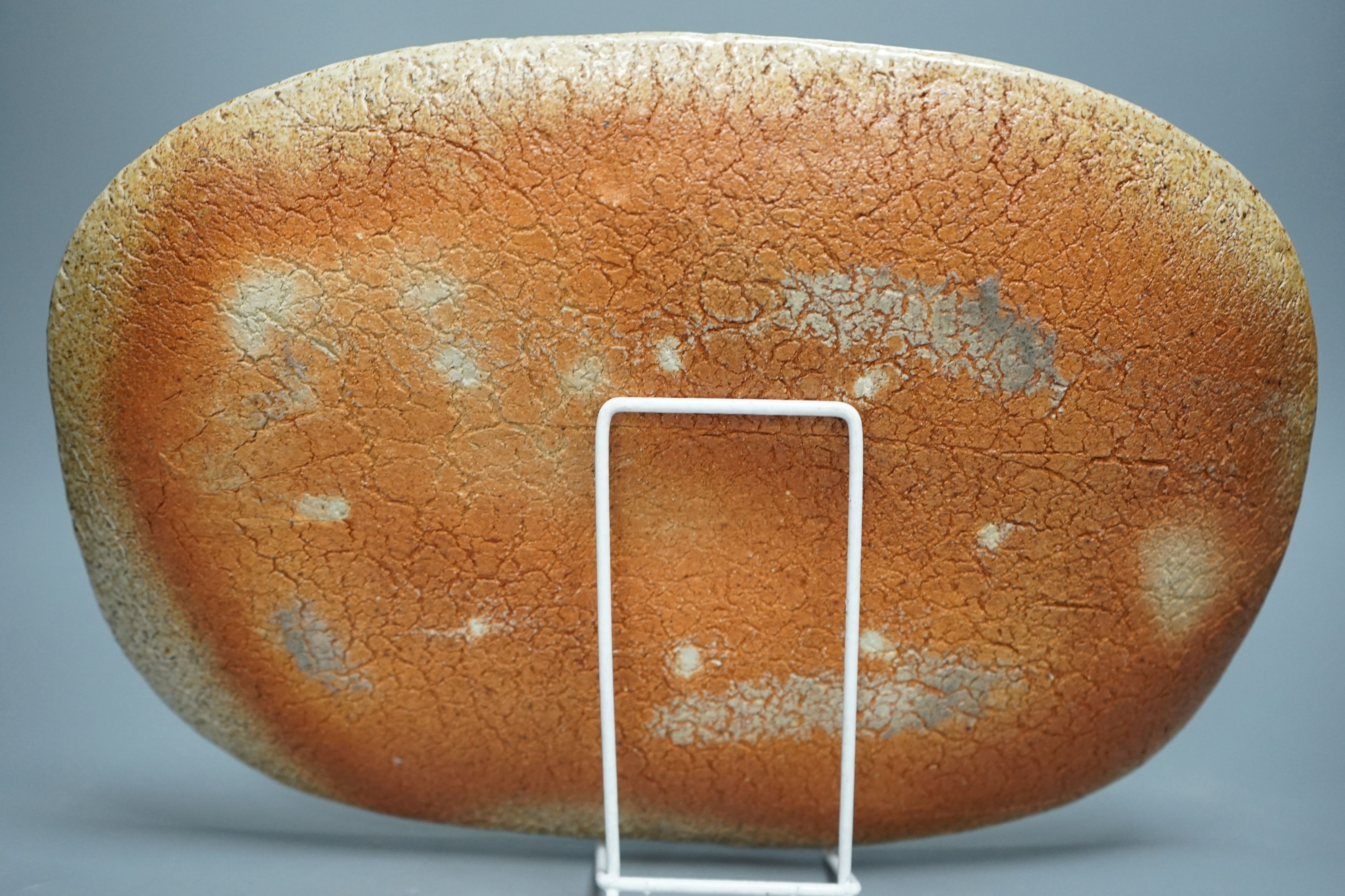 British studio pottery; a group to include a Micki Schloessingk (b.1949) salt glaze teapot and cover, together with other similar items and other studio pottery wares, largest 39cm wide, (5)